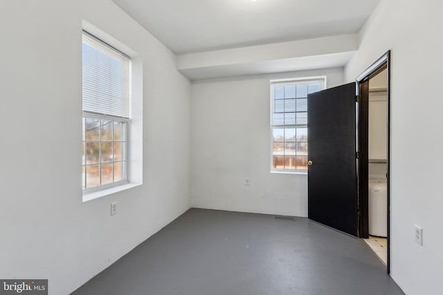 spare room with a wealth of natural light