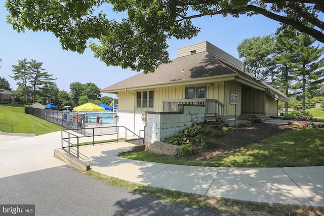 view of home's exterior with a yard