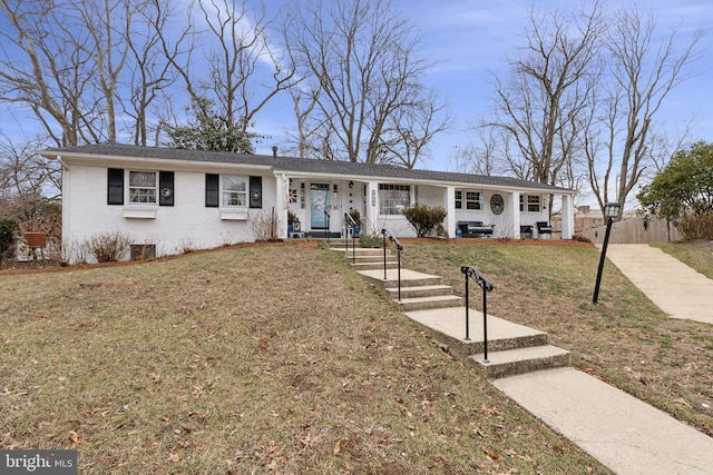 view of front of house with a front lawn