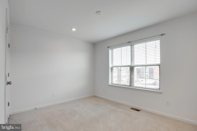 view of carpeted spare room