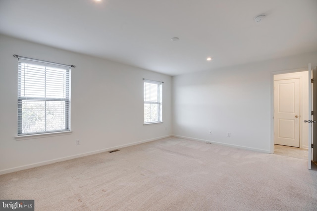 view of carpeted spare room