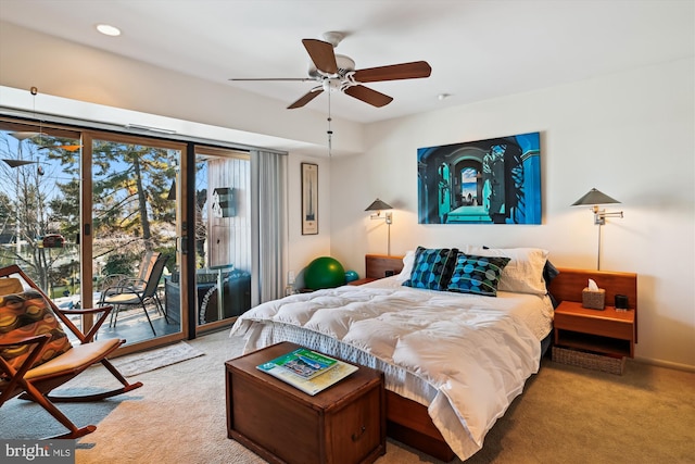 carpeted bedroom featuring access to exterior and ceiling fan