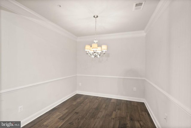 unfurnished room with ornamental molding, dark hardwood / wood-style floors, and a chandelier