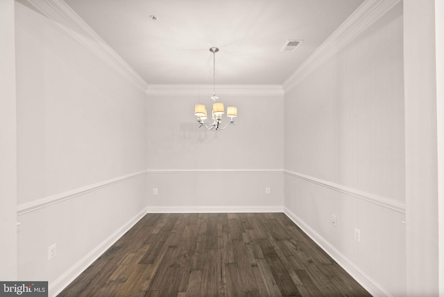 unfurnished dining area with ornamental molding, dark hardwood / wood-style flooring, and a chandelier