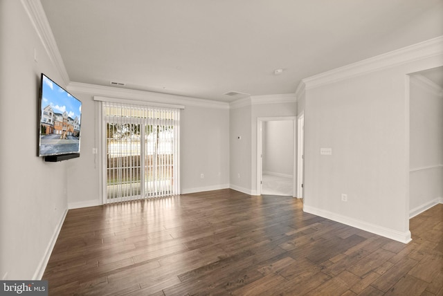 empty room with crown molding and dark wood-type flooring