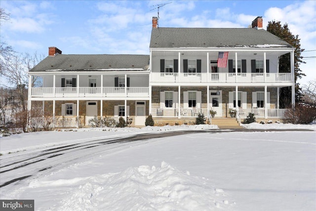 view of snow covered property