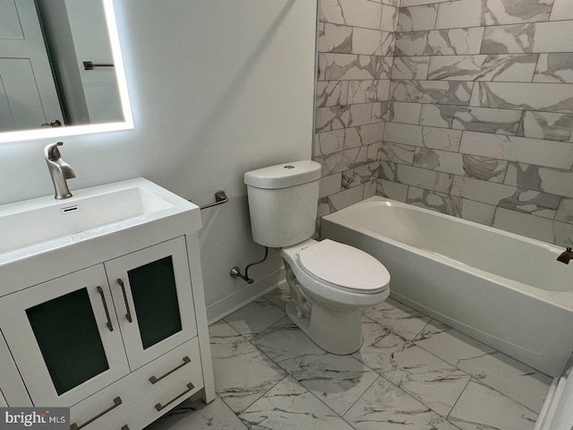 full bathroom with vanity, tiled shower / bath, and toilet