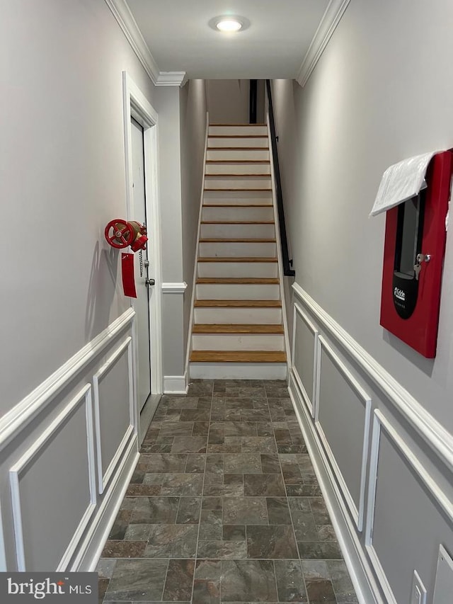 stairs featuring ornamental molding