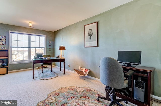 home office featuring carpet flooring