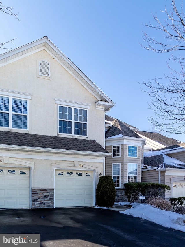 front of property featuring a garage