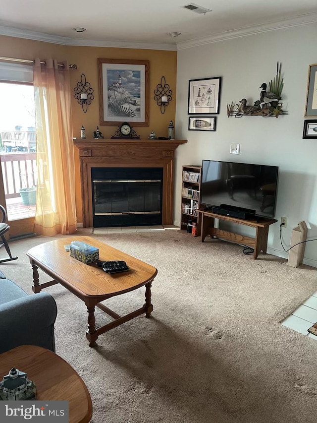 living room featuring ornamental molding and carpet