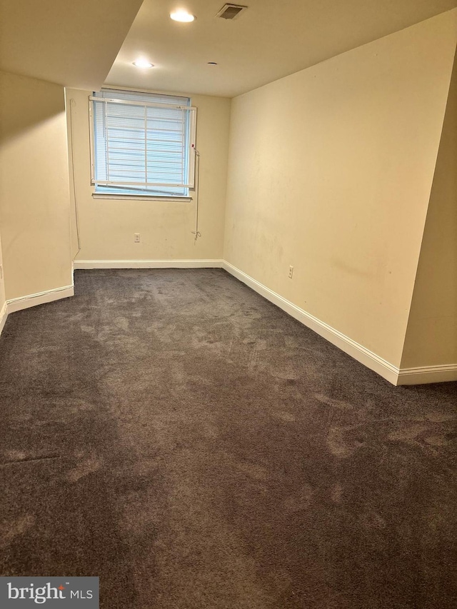 view of carpeted spare room