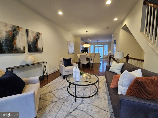 living room with dark hardwood / wood-style floors