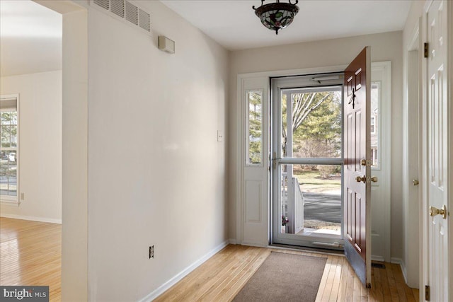 doorway featuring light wood-type flooring