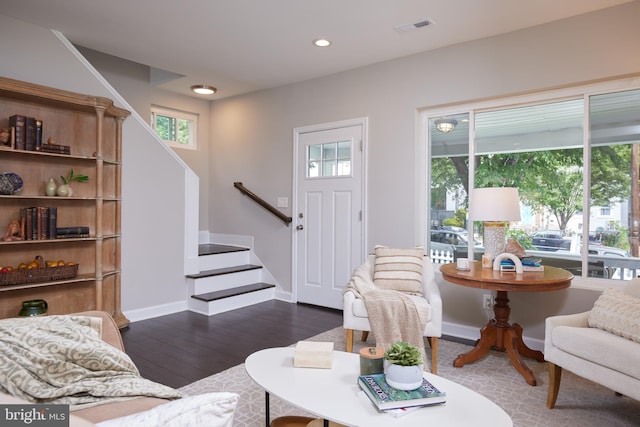 living area with stairway, dark wood-style flooring, recessed lighting, and baseboards