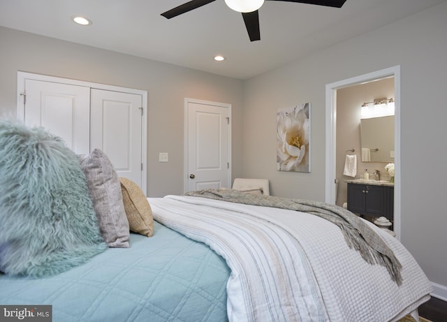 bedroom with a closet, a ceiling fan, connected bathroom, and recessed lighting