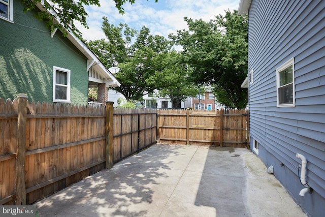 view of patio with fence