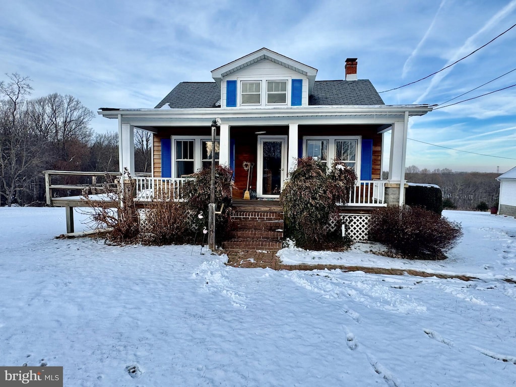 bungalow-style house featuring covered porch