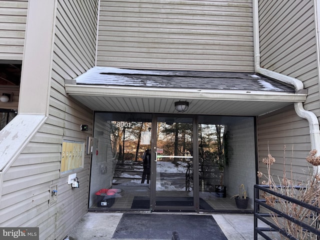 doorway to property featuring a patio area