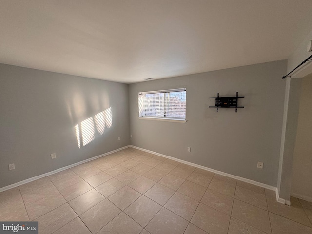 view of tiled empty room