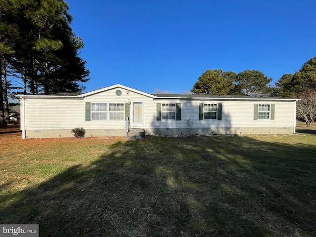 manufactured / mobile home with a front lawn and crawl space