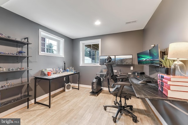 office area with light wood-type flooring