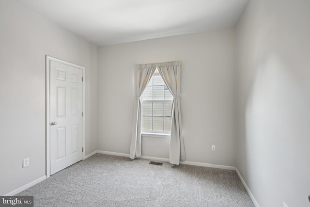 view of carpeted spare room