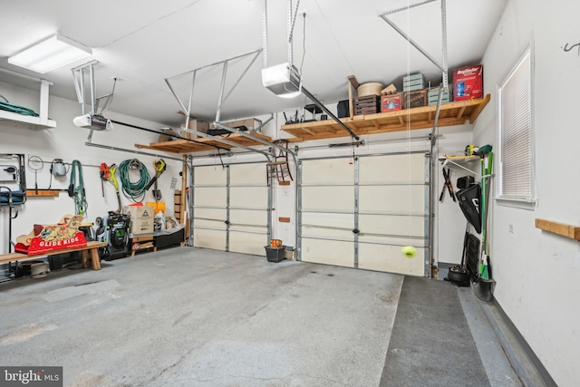 garage featuring a garage door opener