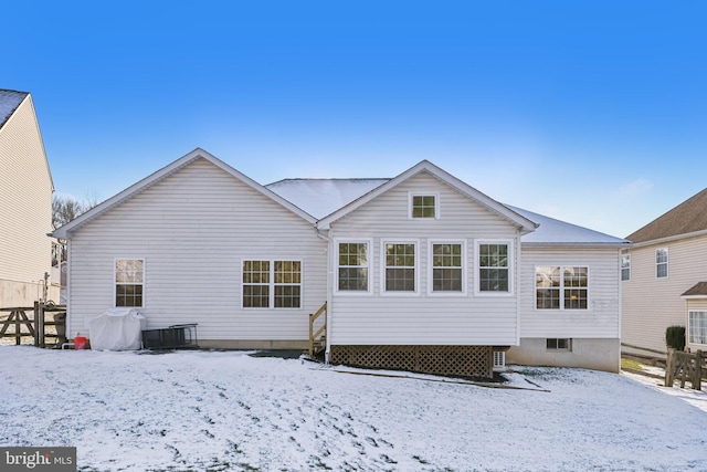 view of snow covered house