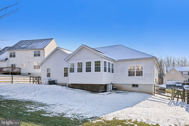 view of snow covered property