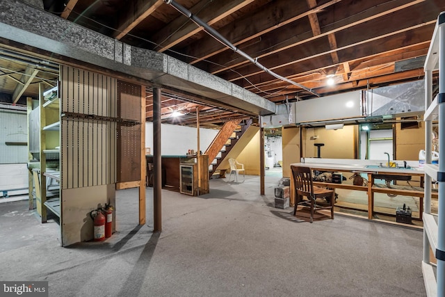 basement with sink and a workshop area