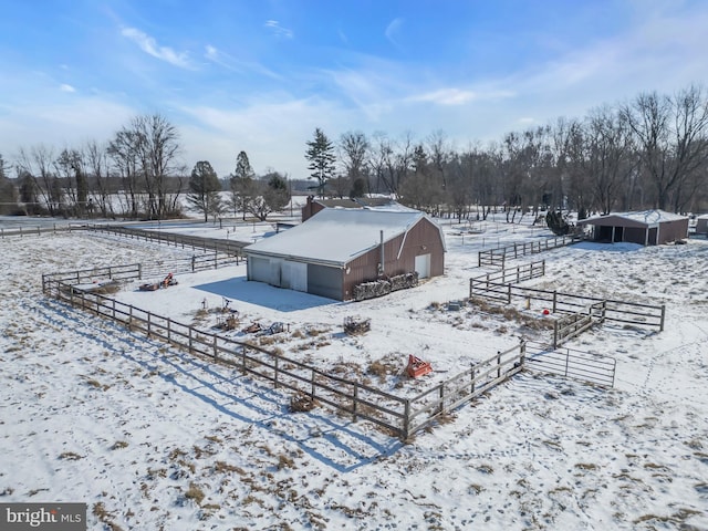 snowy aerial view with a rural view