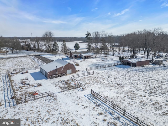 snowy aerial view with a rural view