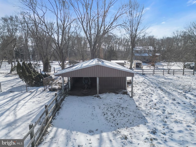 view of yard layered in snow