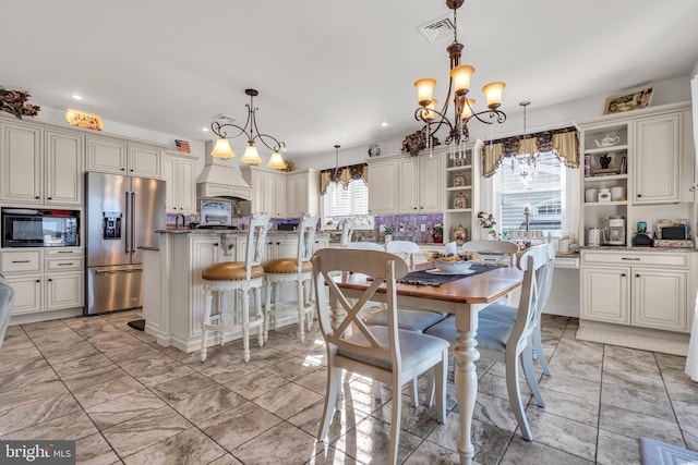 dining room featuring a chandelier