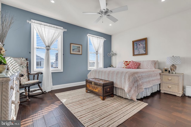 bedroom with dark wood-type flooring and ceiling fan