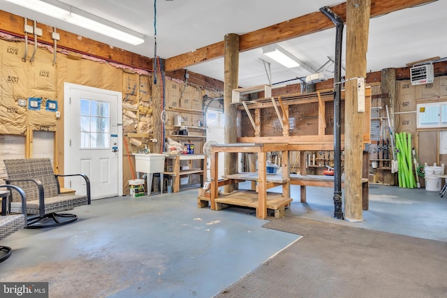 garage featuring sink and a workshop area