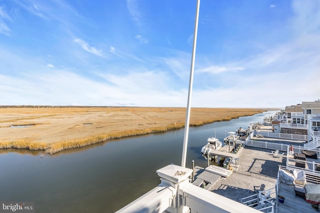 dock area featuring a water view