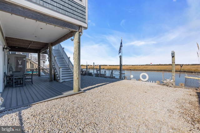 exterior space with a water view