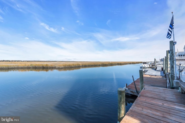 view of dock with a water view