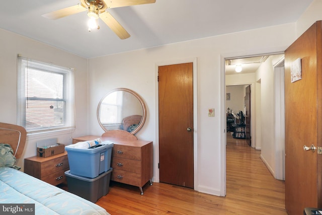 bedroom featuring ceiling fan and light hardwood / wood-style floors