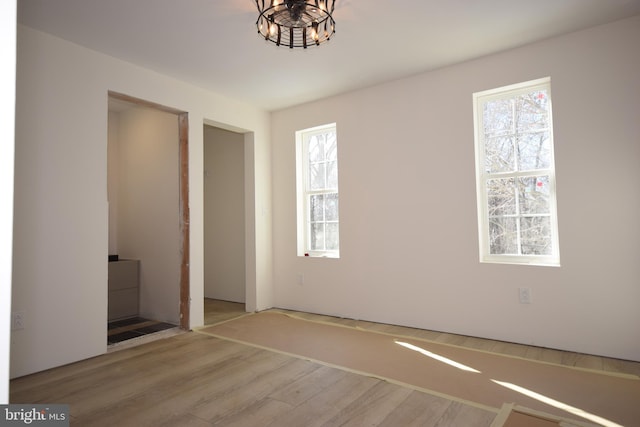 unfurnished bedroom with wood-type flooring