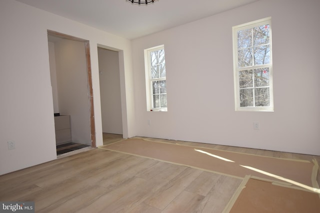 unfurnished bedroom with light hardwood / wood-style flooring