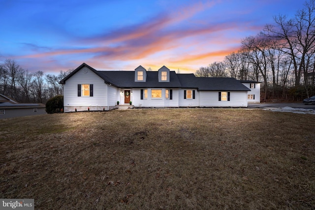 view of front of home featuring a yard