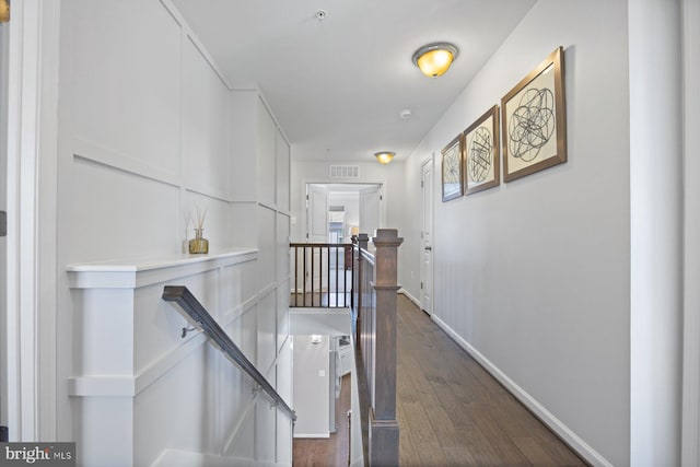 hall featuring dark wood-type flooring