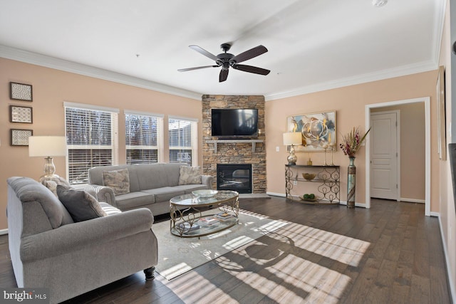 living room featuring ceiling fan, ornamental molding, and dark hardwood / wood-style floors