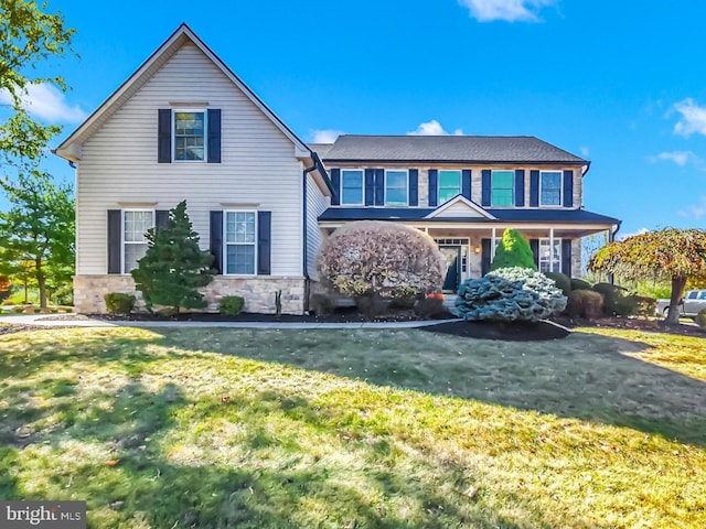 view of front of property with a front yard