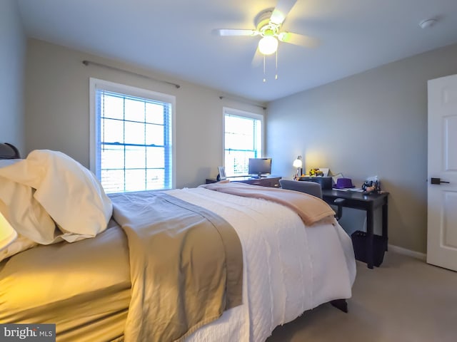 bedroom featuring ceiling fan and carpet flooring