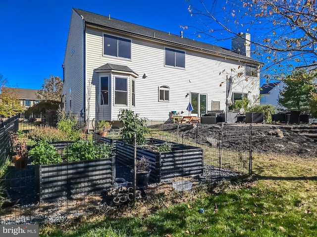 rear view of property with a patio