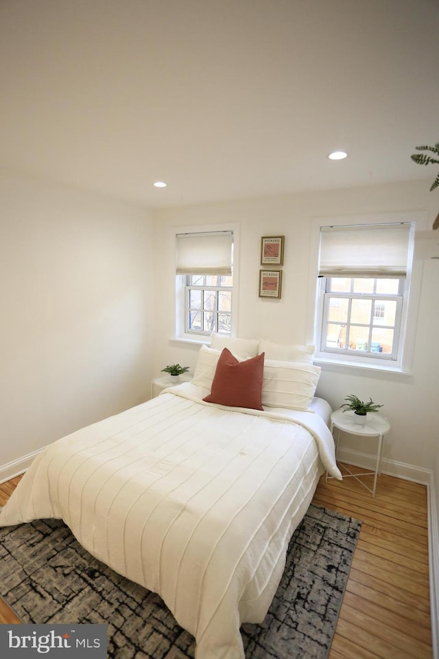 bedroom featuring wood-type flooring